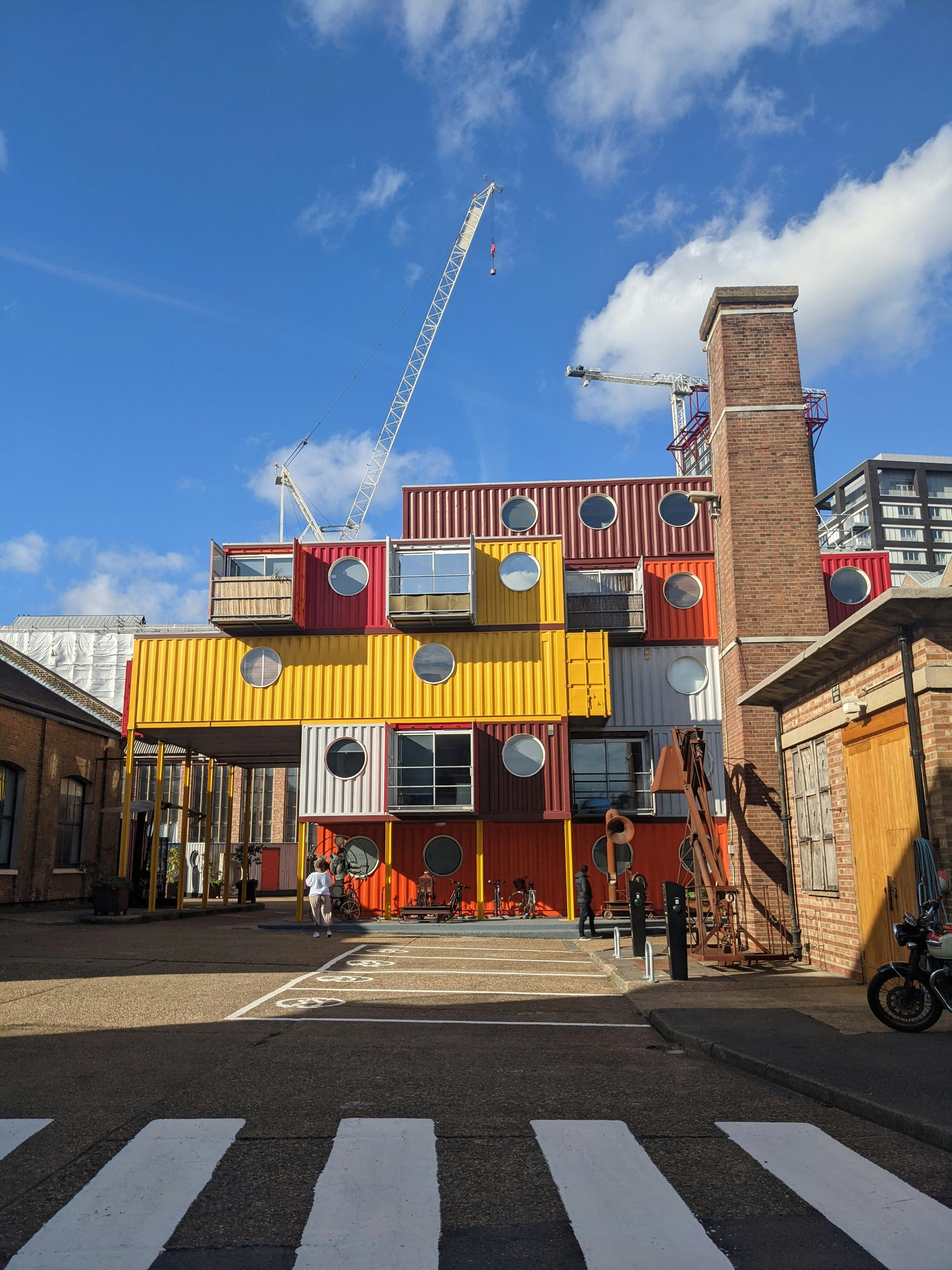 A factory-built home exterior, illustrating the delivered-cost comparison between alternative housing formats.